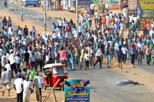 Sudanese protestors demonstrate in Khartoum's twin city of Omdurman after the government announced steep price rises for petroleum products after suspending state subsidies as part of crucial economic reforms on September 25, 2013.